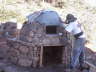 Stone mason covering oven